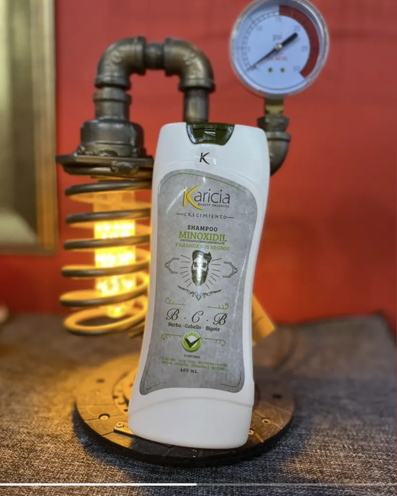 Shampoo con minoxidil